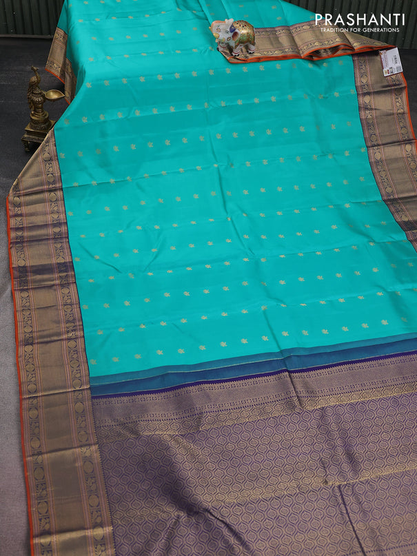 Pure kanchipuram silk saree teal green and navy blue with zari woven buttas and zari woven border