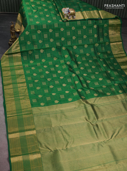 Pure kanchipuram silk saree green with allover zari checks & buttas and long rich zari woven border