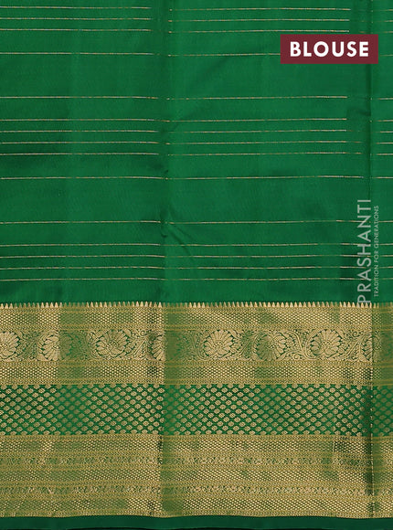 Pure kanchipuram silk saree green with allover zari checks & buttas and long rich zari woven border