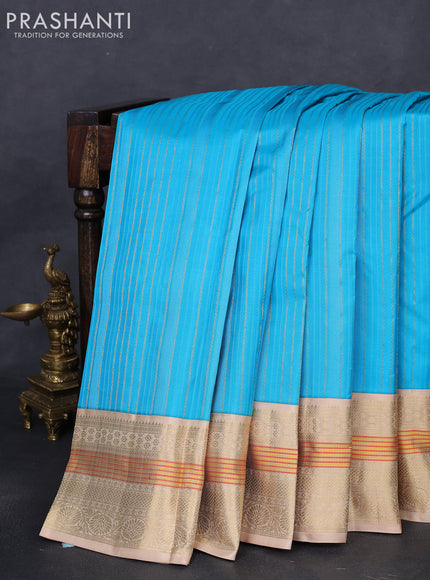 Pure kanchipuram silk saree light blue and sandal with allover self emboss & zari weaves and zari woven korvai border