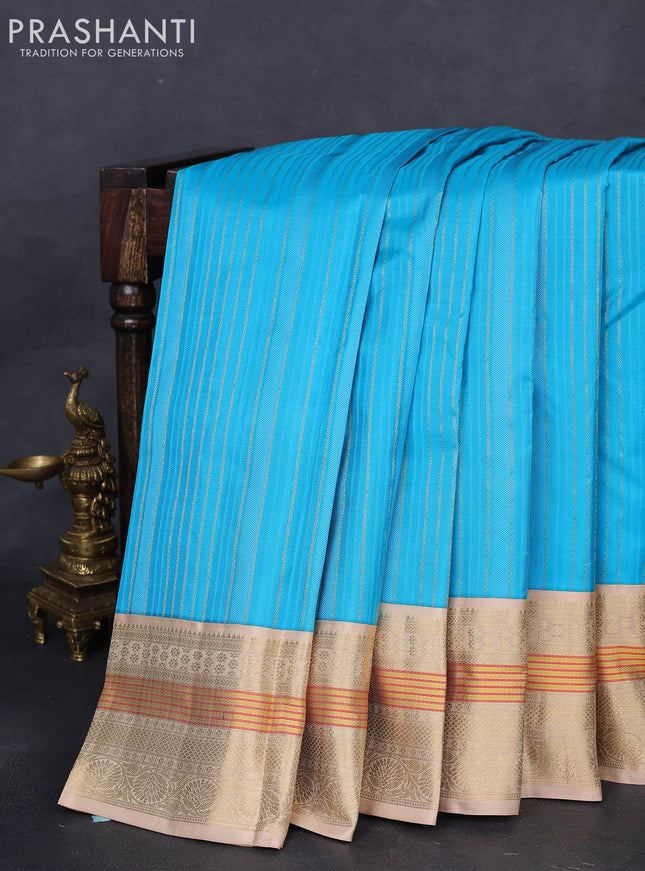 Pure kanchipuram silk saree light blue and sandal with allover self emboss & zari weaves and zari woven korvai border