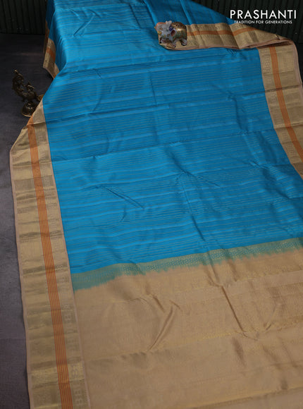 Pure kanchipuram silk saree light blue and sandal with allover self emboss & zari weaves and zari woven korvai border
