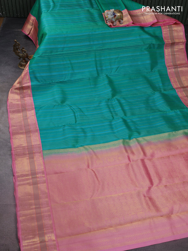 Pure kanchipuram silk saree teal green shade and light pink with allover self emboss & zari weaves and zari woven korvai border