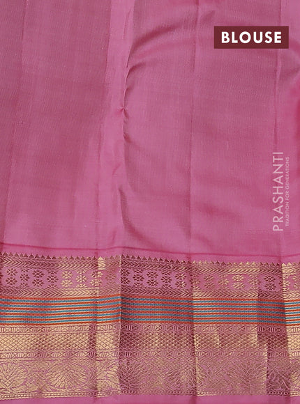 Pure kanchipuram silk saree teal green shade and light pink with allover self emboss & zari weaves and zari woven korvai border