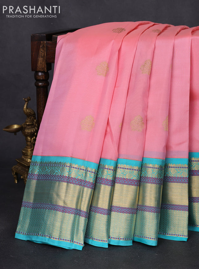 Pure kanchipuram silk saree peach shade and teal blue with zari woven buttas and long rich zari woven border