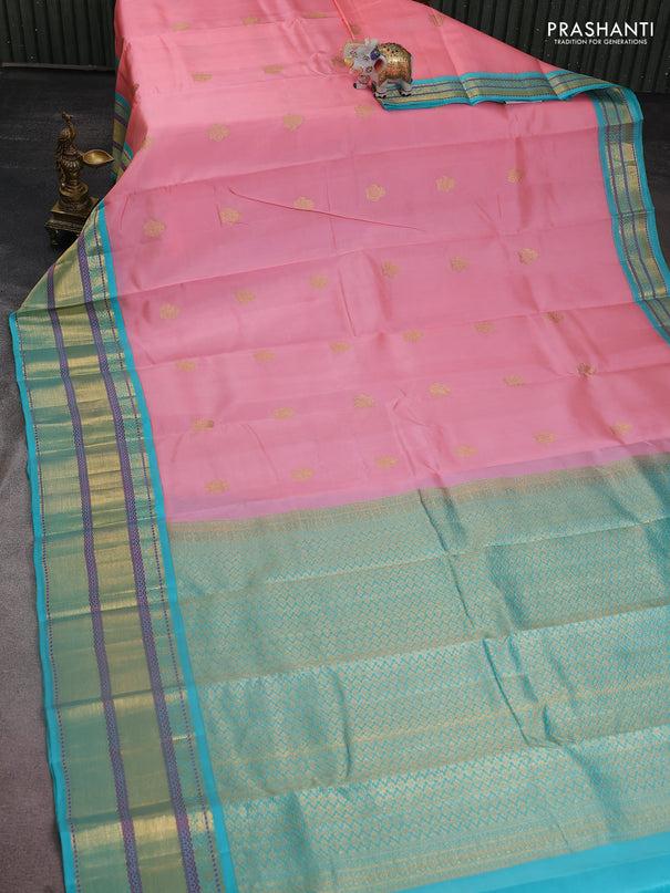 Pure kanchipuram silk saree peach shade and teal blue with zari woven buttas and long rich zari woven border