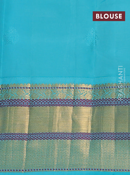 Pure kanchipuram silk saree peach shade and teal blue with zari woven buttas and long rich zari woven border