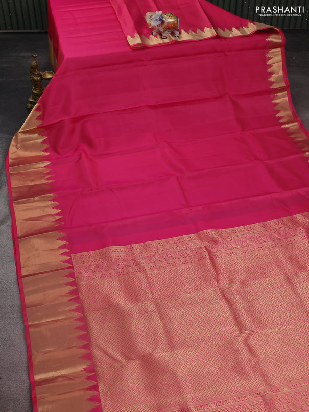 Pure kanchipuram silk saree pink with plain body and temple design zari woven border
