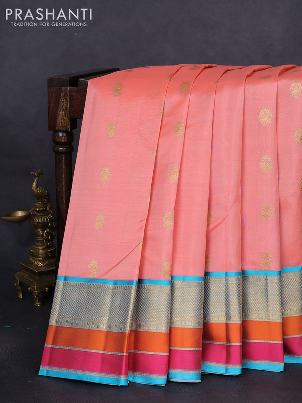 Pure kanchipuram silk saree peach orange and teal blue with zari woven buttas and zari woven border