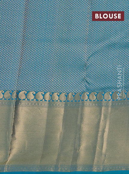 Pure kanchipuram silk saree dual shade of teal blue with plain body and long zari woven border