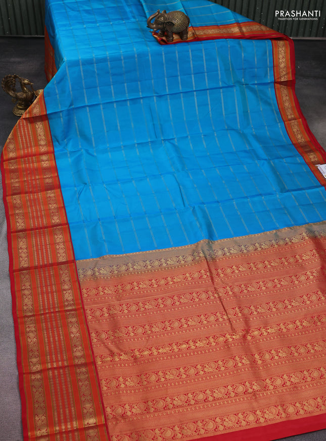 Pure kanchipuram silk saree cs blue and red with allover zari stripes pattern and long zari woven border