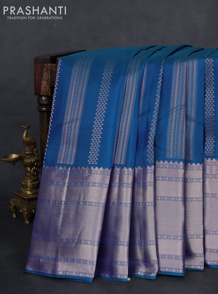 Pure kanchipuram silk saree dual shade of blue and peach pink with allover zari weaves and long zari woven border