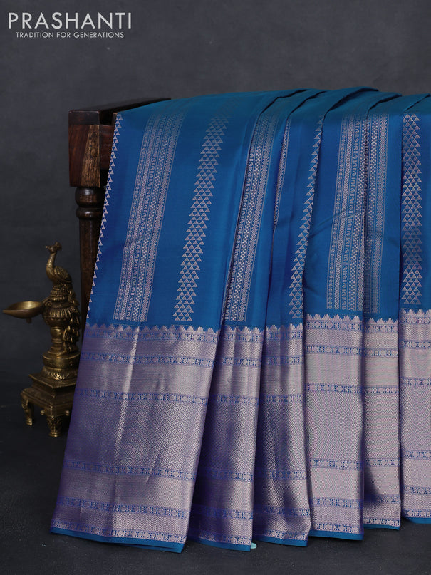 Pure kanchipuram silk saree dual shade of blue and peach pink with allover zari weaves and long zari woven border