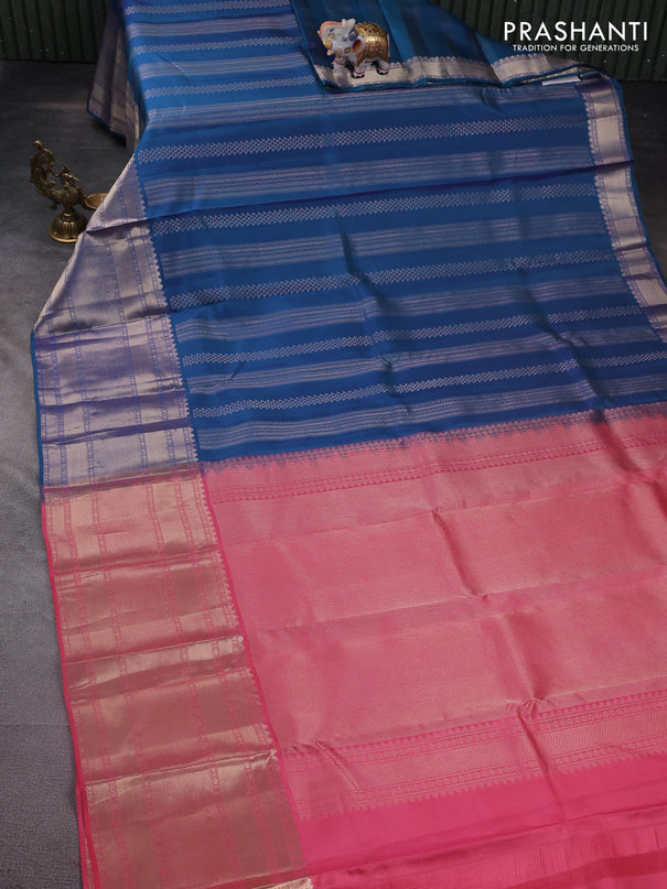 Pure kanchipuram silk saree dual shade of blue and peach pink with allover zari weaves and long zari woven border