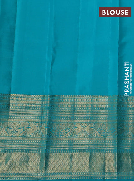 Pure kanchipuram silk saree pastel peach and teal blue with zari woven buttas and long zari woven korvai border