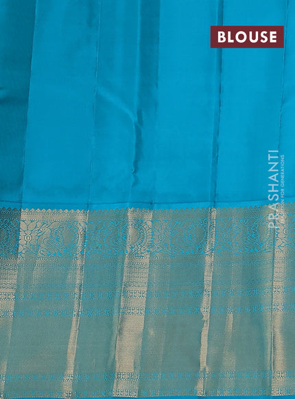Pure kanchipuram silk saree candy pink and teal blue with paisley zari woven buttas and long annam zari woven korvai border