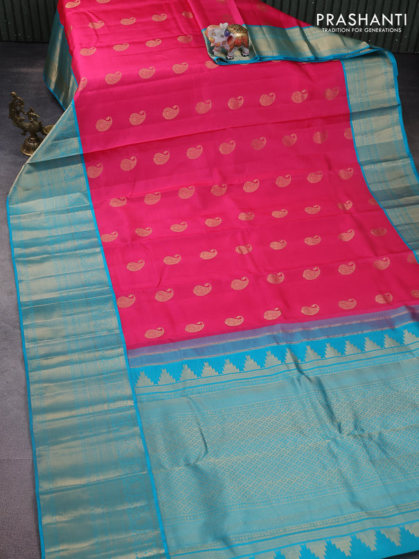 Pure kanchipuram silk saree candy pink and teal blue with paisley zari woven buttas and long annam zari woven korvai border