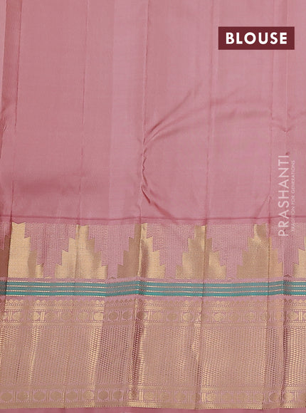 Pure kanchipuram silk saree green shade and pastel peach with paisley zari woven buttas and long temple design zari woven korvai border