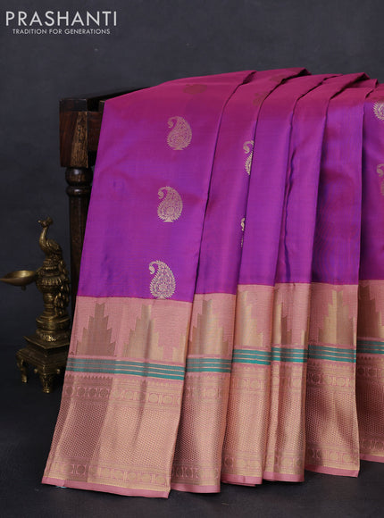 Pure kanchipuram silk saree purple and pastel peach with paisley zari woven buttas and long temple design zari woven korvai border