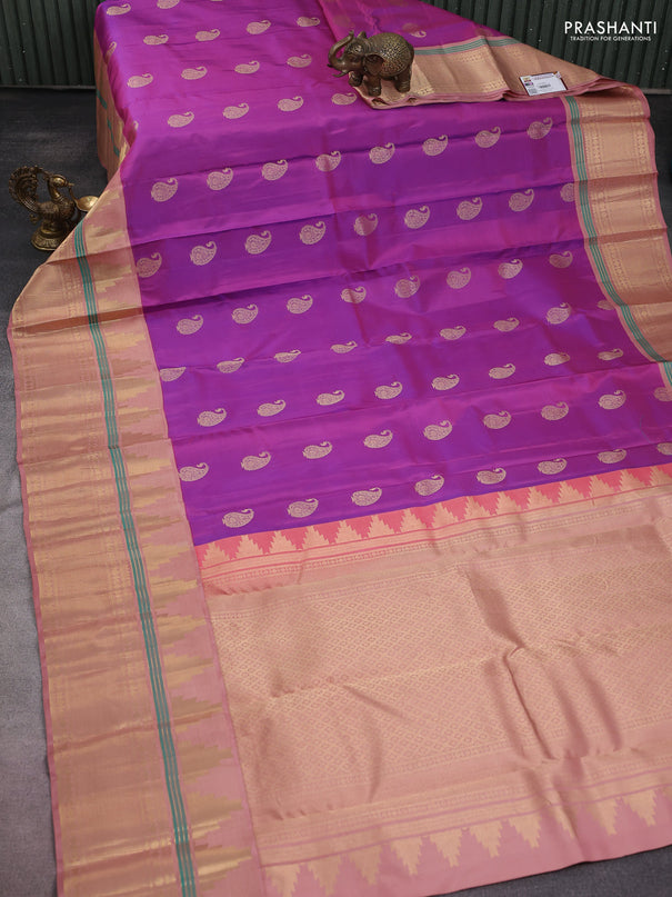 Pure kanchipuram silk saree purple and pastel peach with paisley zari woven buttas and long temple design zari woven korvai border