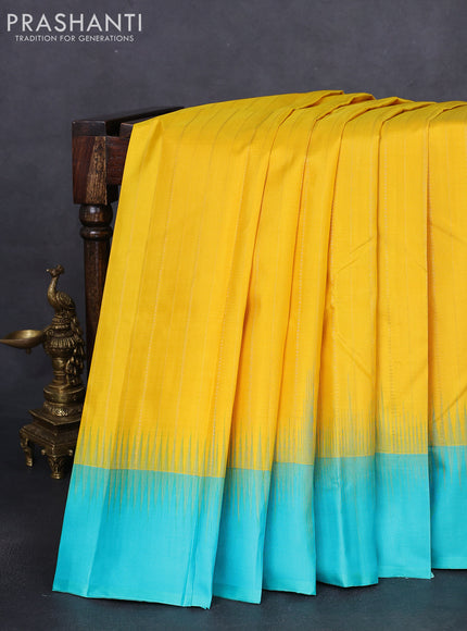 Pure kanchipuram silk saree yellow and teal blue with allover zari weaves and simple border