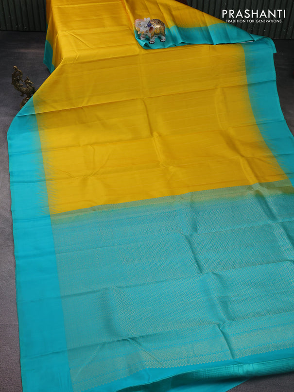 Pure kanchipuram silk saree yellow and teal blue with allover zari weaves and simple border