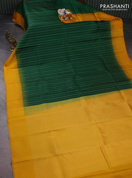 Pure kanchipuram silk saree green and mustard yellow with allover zari weaves and simple border
