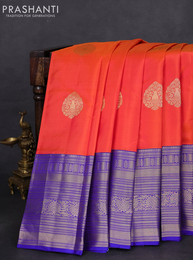 Pure kanchipuram silk saree dual shade of orange and blue with zari woven buttas and long zari woven korvai border