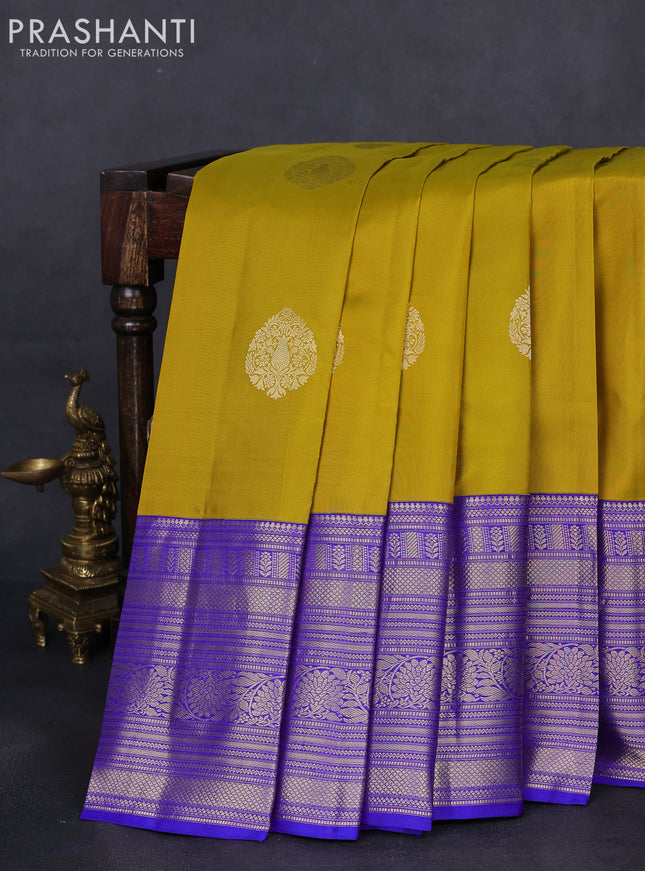 Pure kanchipuram silk saree mustard yellow and blue with zari woven buttas and long zari woven korvai border