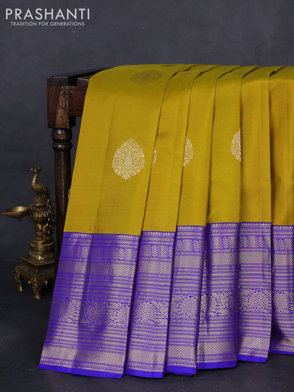 Pure kanchipuram silk saree mustard yellow and blue with zari woven buttas and long zari woven korvai border
