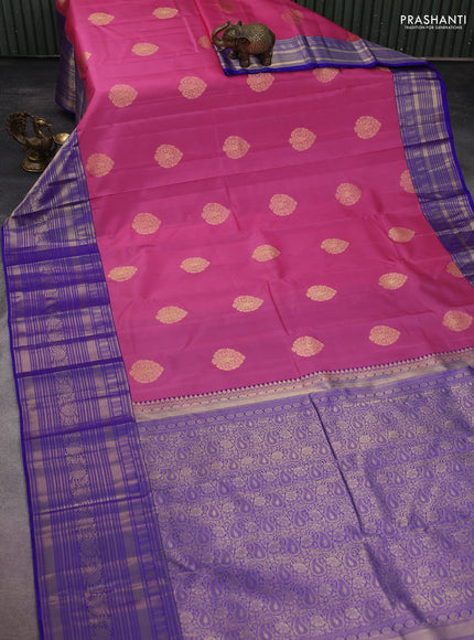 Pure kanchipuram silk saree light pink and blue with zari woven buttas and long zari woven korvai border