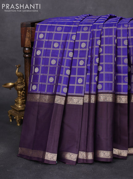 Pure kanchipuram silk saree blue and wine shade with allover zari checks & buttas and long rettapet zari woven border