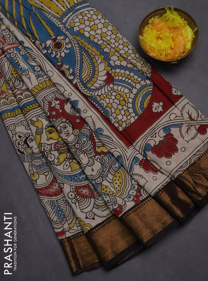 Kalamkari semi silk saree beige and coffee brown with allover prints and zari woven border