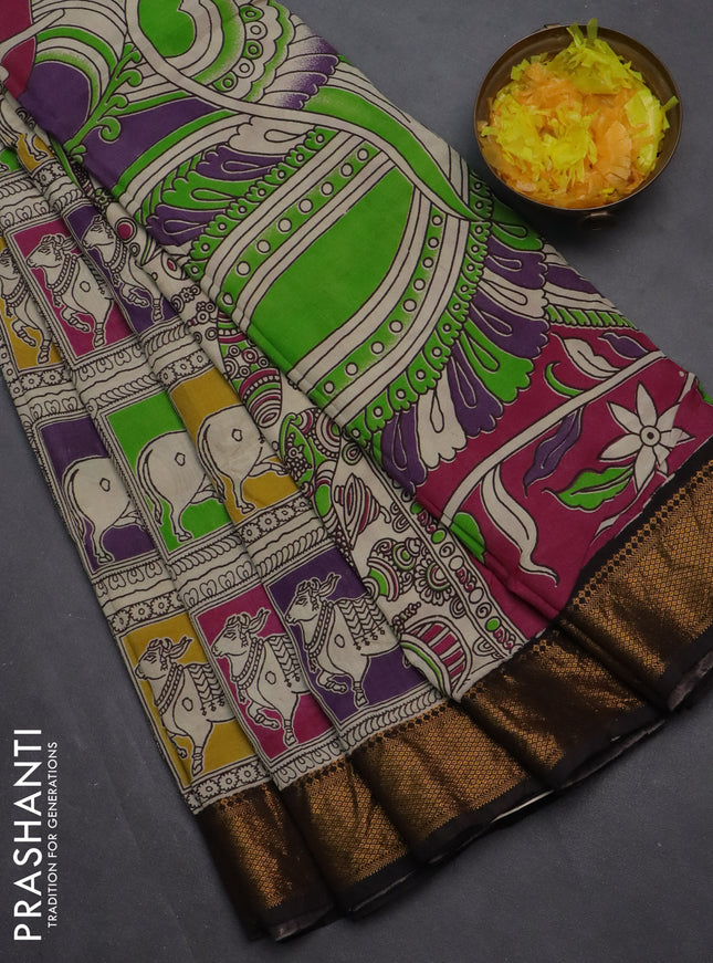 Kalamkari semi silk saree multi colour and black with allover prints and zari woven border