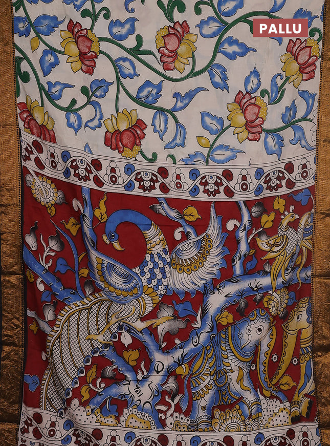 Kalamkari semi silk saree beige and black with allover prints and zari woven border