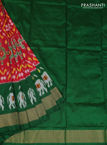Ikat silk kids lehenga red and green with allover ikat weaves and long ikat woven zari border