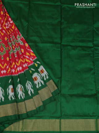 Ikat silk kids lehenga red and green with allover ikat weaves and long ikat woven zari border