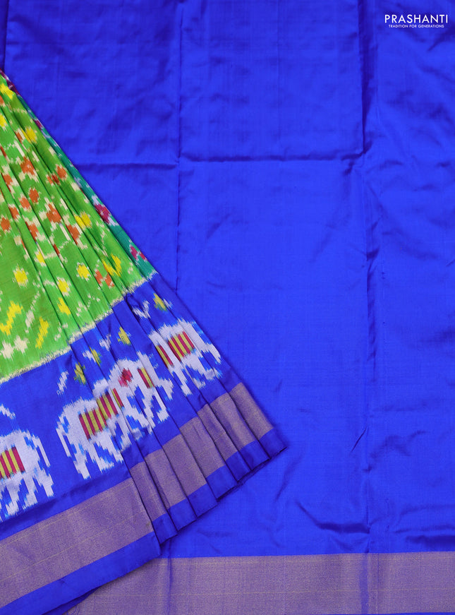 Ikat silk kids lehenga light green and royal blue with allover ikat weaves and long ikat woven zari border