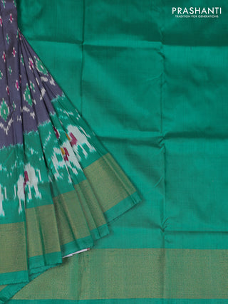 Ikat silk kids lehenga grey and teal green with allover ikat butta weaves and long ikat woven zari border