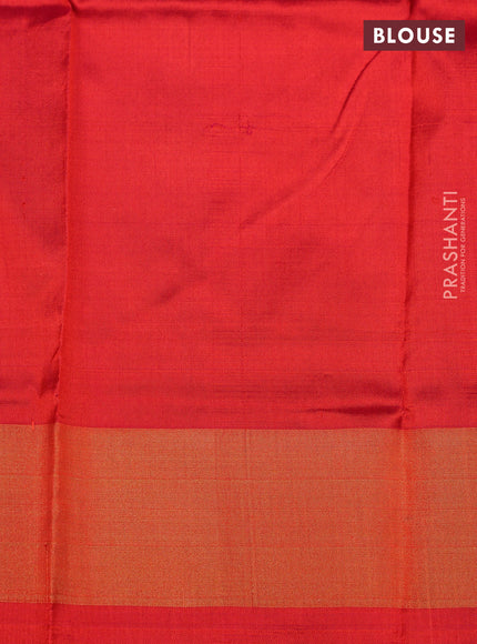 Ikat silk kids lehenga green and pinkish orange with allover ikat weaves and long ikat woven zari border