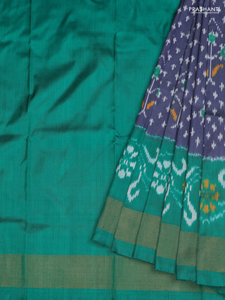Ikat silk kids lehenga grey and teal green with allover ikat weaves and long ikat woven zari border