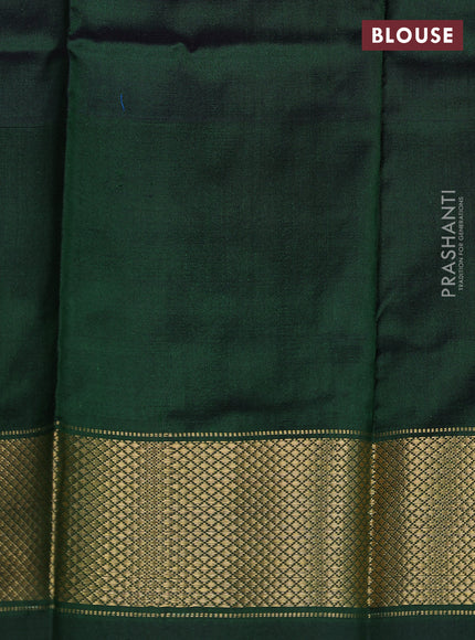 Ikat silk kids lehenga pink and green with allover ikat weaves and long ikat woven zari border