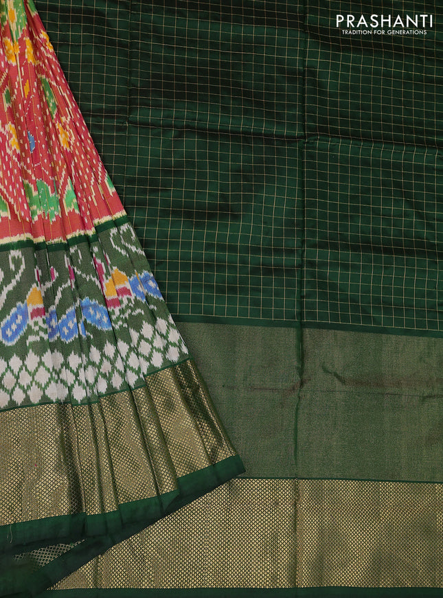 Ikat silk kids lehenga pink shade and green with allover zari checks & ikat weaves and long ikat woven zari border