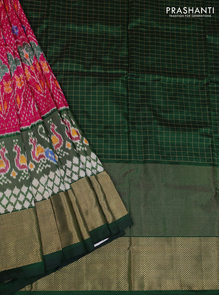 Ikat silk kids lehenga pink and dark green with allover zari checks & ikat weaves and long ikat woven zari border