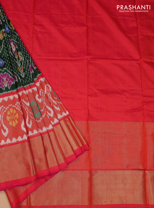 Ikat silk kids lehenga green and dual shade of pinkish orange with allover ikat weaves and long ikat woven zari border