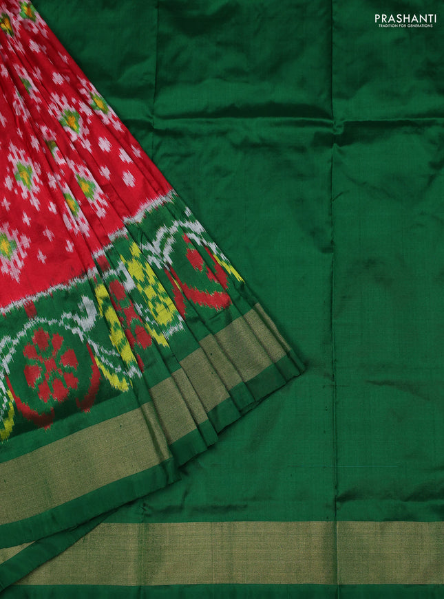 Ikat silk kids lehenga red and green with allover ikat weaves and long ikat woven zari border