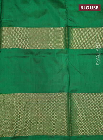 Ikat silk kids lehenga pink and green with allover ikat weaves and zari woven border