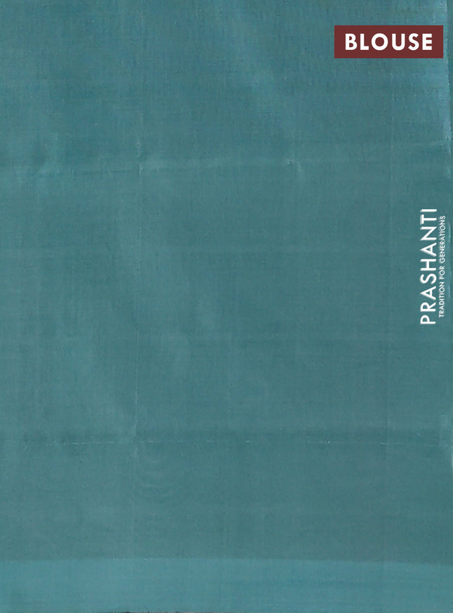 Banana pith saree pale orange and teal green with thread woven buttas in borderless style