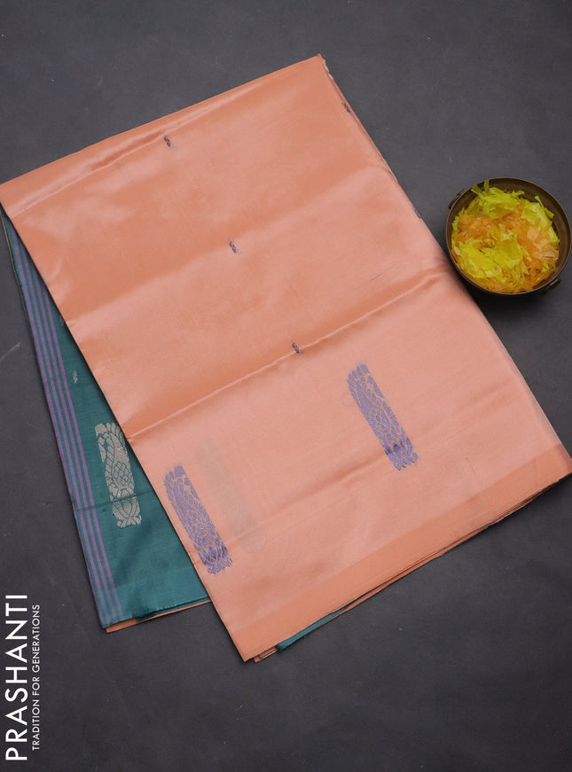 Banana pith saree pale orange and teal green with thread woven buttas in borderless style