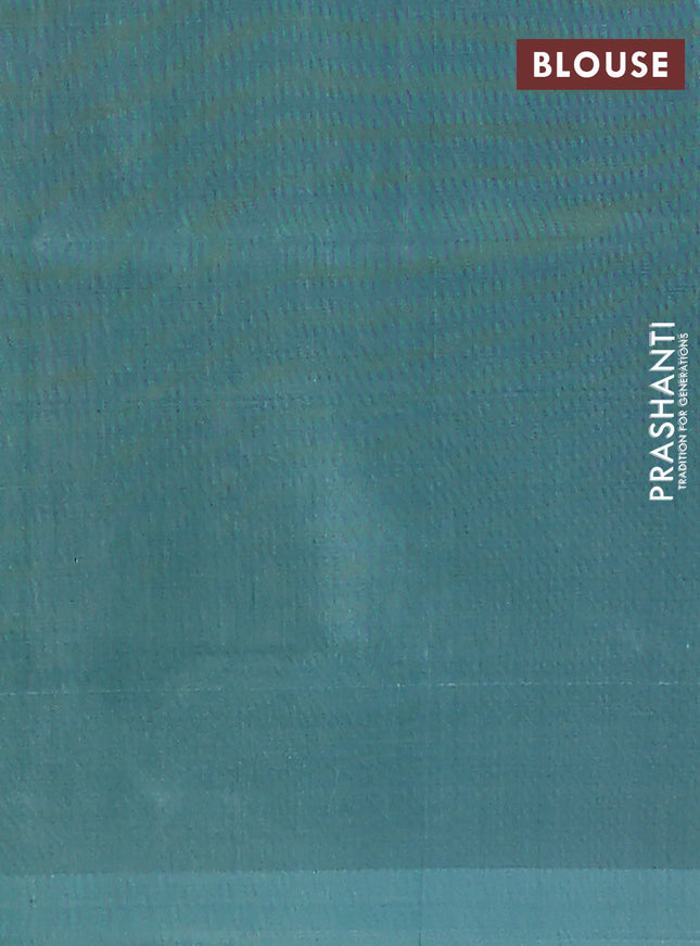 Banana pith saree pale orange and teal green with thread woven buttas in borderless style